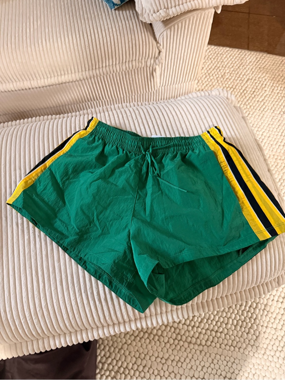 Adidas Green Women's Athletic Shorts with Yellow Stripe